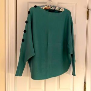 A Stitch Fix sweater. Very cute button detail.